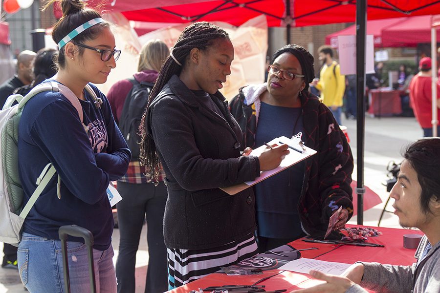 Students sign up for the Extended Opportunities Programs and Services Club at Fresno City College on Wednesday, Jan. 24, 2018. 