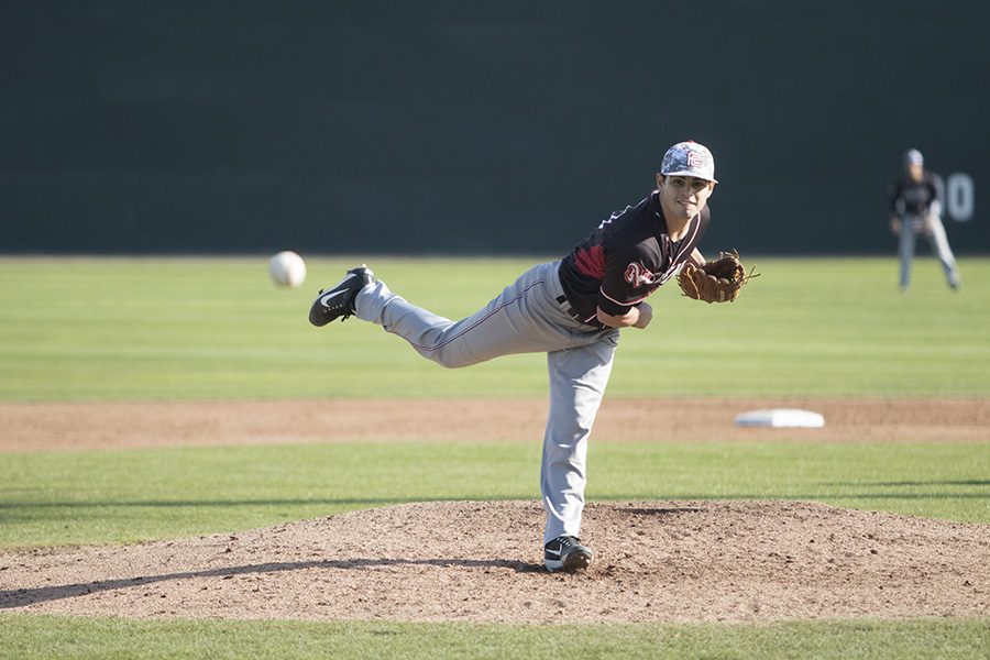 Pitcher DJ Martinez, throws a fast ball down the middle against a player from Skyline on Saturday, Jan 27, 2018. 