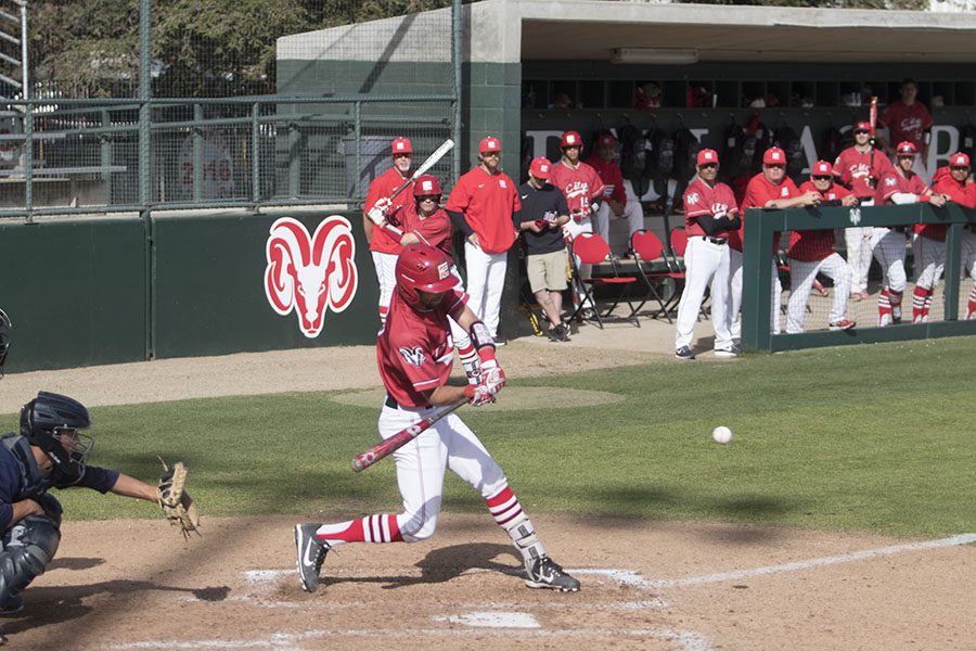 Sophmore Jacob Paradine hits the ball clear out to left field against pitcher from College of the Sequoias allowing Rams to score two runs on Thursday March 15, 2018. Photo by Larry Valenzuela