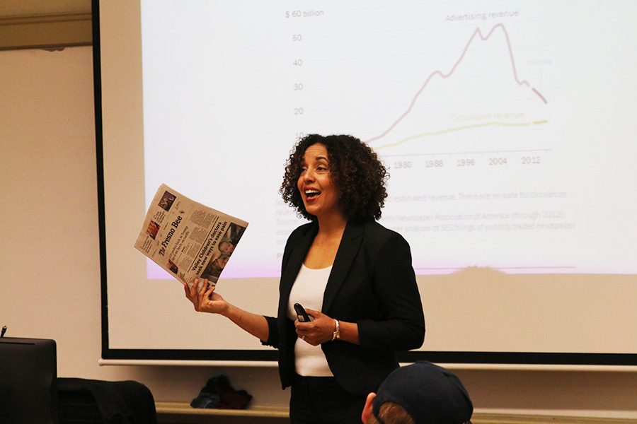 Fresno City College professor Kathleen Schock teaches her students about the history of newspapers on Tuesday, March 6, 2018.
