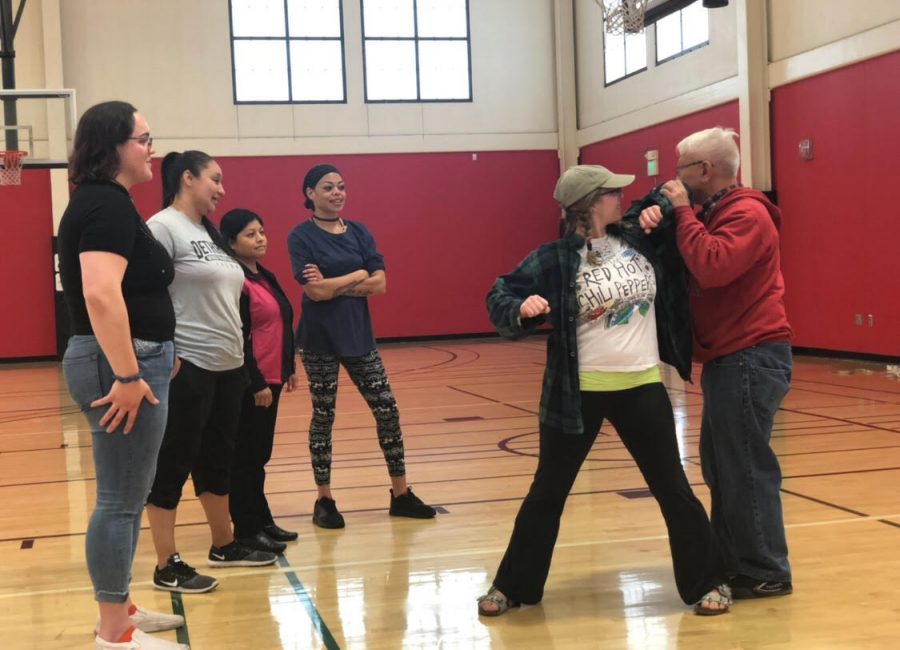 Fresno City College Instructor John Cho teaches FCC students martial arts techniques in Women’s Self Defense Work Shop .