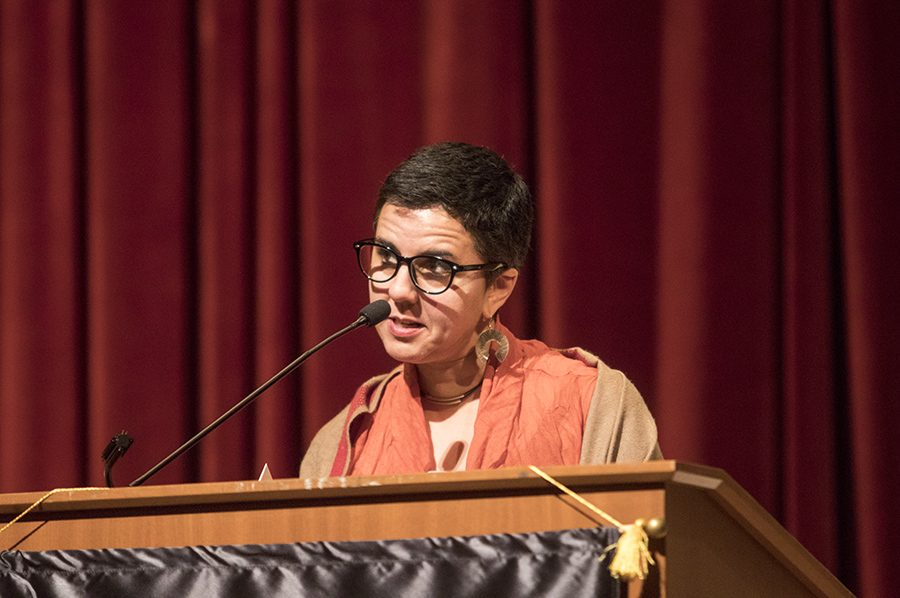 Keynote speaker Carmen Giménez Smith reads pieces from her new book during LitHop at Fresno City College on Saturday, April 21, 2018.