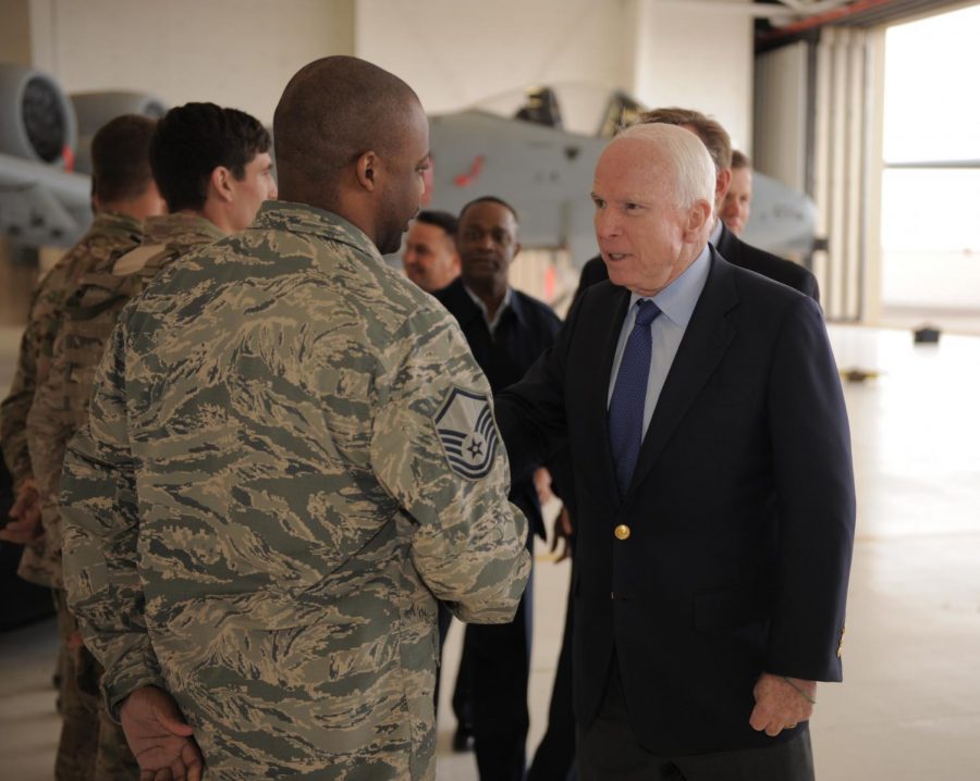 Marcquis+Simon%2C+48th+Rescue+Squadron+logistics+flight+superintendent%2C+shakes+hands+with+Sen.+John+McCain+at+Davis-Monthan+Air+Force+Base%2C++Dec.+18%2C+2014.+