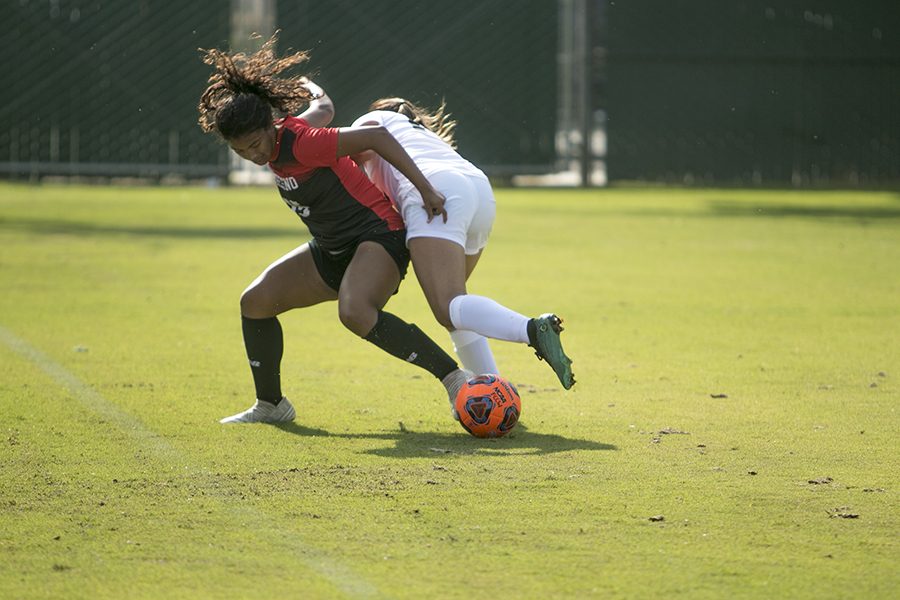 Erika Calderon (left) and Justyne Sanchez (right) battle for the ball at practice for the Fresno College Rams at Ratcliffe Stadium soccer field on Friday, Aug. 24, 2018. Photo by Larry Valenzuela