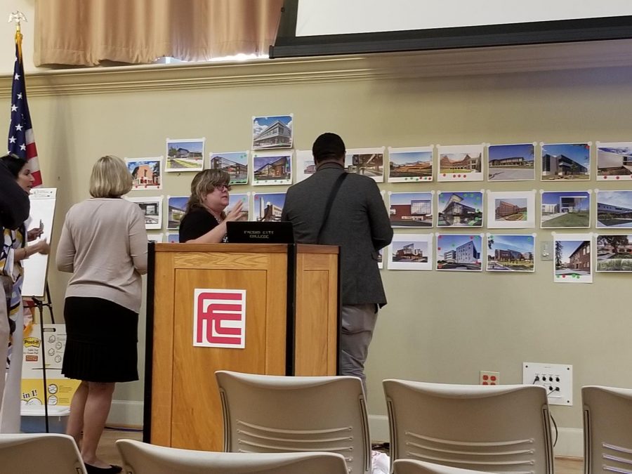 Fresno City College faculty review the architectural plans.