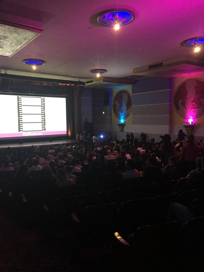 Audience preparing for the viewing of ‘The Life of Lei: The Man Behind The Makeup’ at Tower Theatre for Fresno Reel Pride Film Festival Thursday, Sept. 20, 2018.