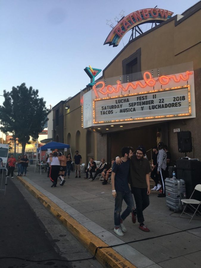 People line up to watch the wrestling match and walk around Lucha Fest in downtown Fresno Saturday Sept. 22, 2018.