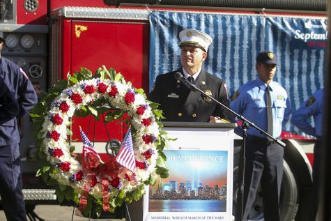 Jacob McAfee, Fresno City College Fire Academy Director, delivers a opening speech at the Memorial March near the Free Speech Area on Tuesday, Sept. 11, 2018. Photo by Larry Valenzuela