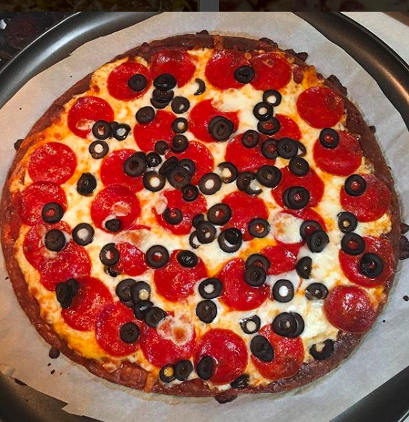 Keto-style pizza, also known as Fathead Pizza, which includes almond flour, mozzarella cheese, cream cheese, and other toppings. Sept. 18, 2018.