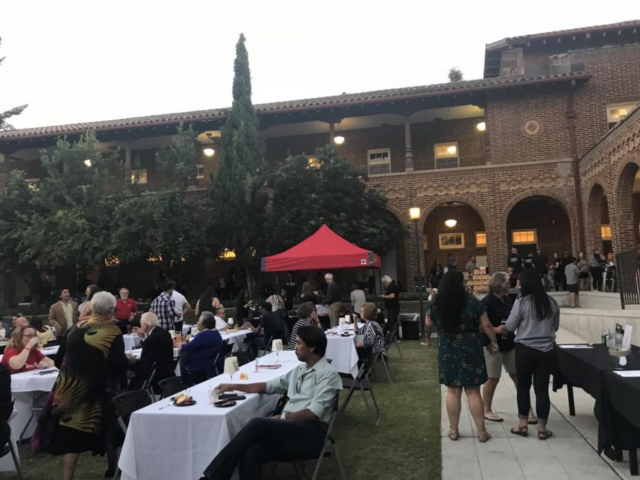 CityFest attendees dine and converse in the courtyard of FCC’s Old Administration Building  Friday September 21, 2018.