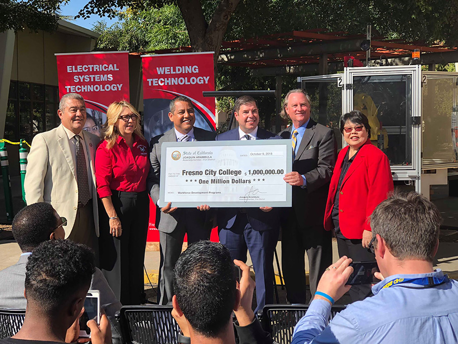 Joaquin Arambula awards a one million dollar grant to FCC's Career and Technical Education program to build a new robotics lab, 9 Oct. 2018.