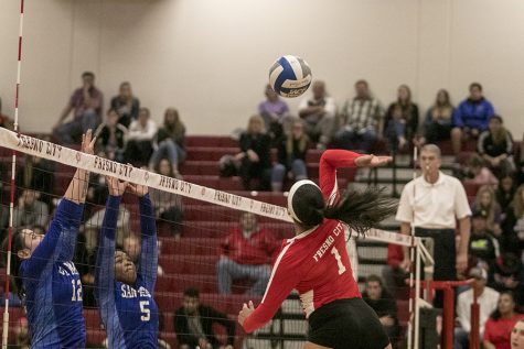 Marina Gonzalez spikes the ball for a kill against San Mateo College Gymnasium on Tuesday, Nov. 20, 2018. Photo by Larry Valenzuela