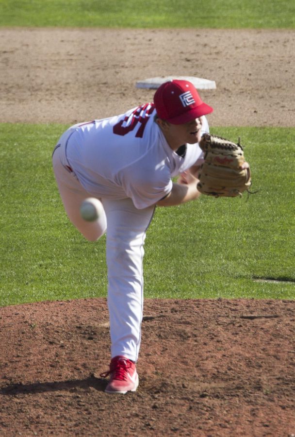 Rams pitcher Kohl Simas fires a pitch to the plate in the Rams' home opener against the Feather River College Golden Eagles on Jan. 27, 2019.