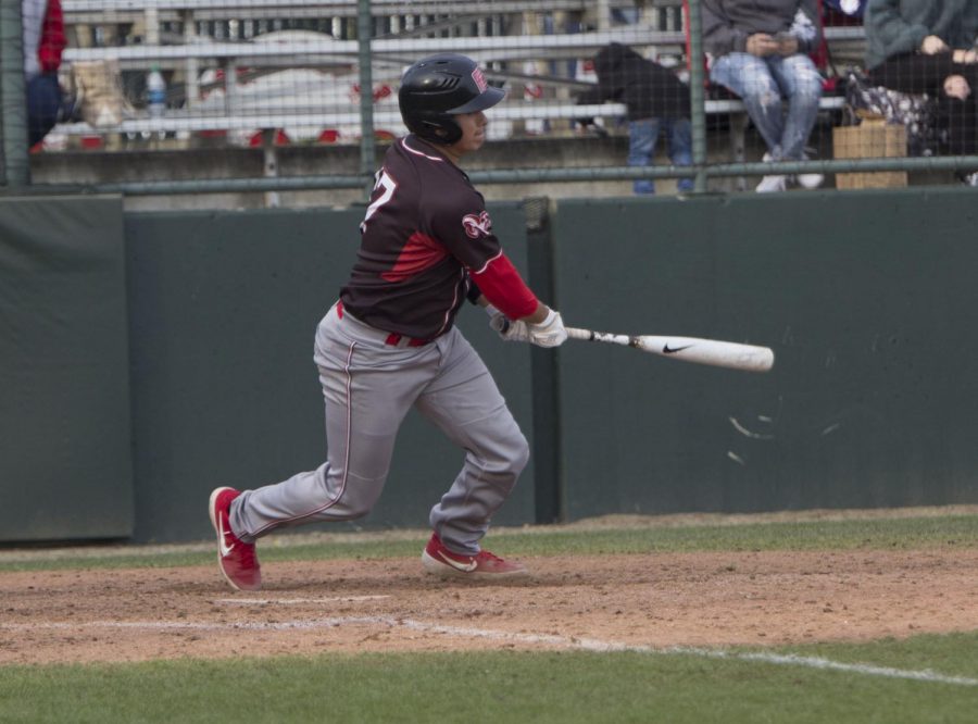 Jacob Topete drives in a run for the Rams against Cabrillo College in their 8-4 loss on Feb. 23, 2019.