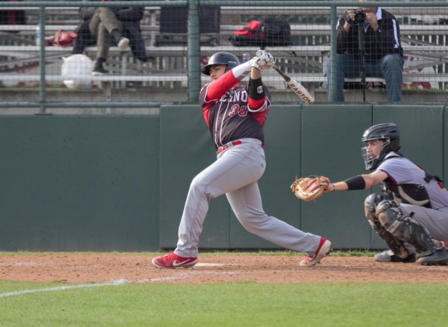 Marcus Davis takes a swing at a pitch during the Rams doubleheader against the Los Medanos Mustangs on Feb. 1, 2019. Photo by Ben Hensley