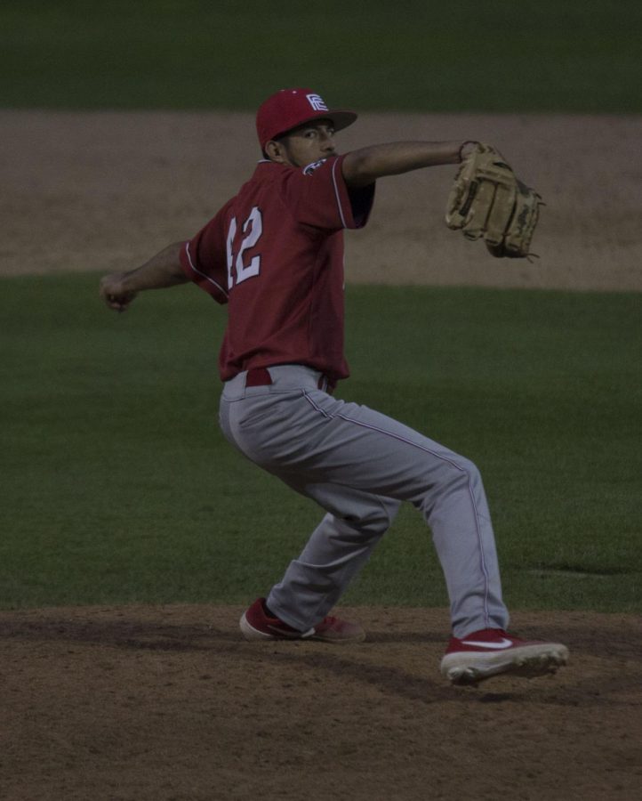 Sophomore pitcher Jiovanni Saavedra kicks into his delivery against Chabot College in the Rams game on Feb. 8, 2019. Photo by Ben Hensley