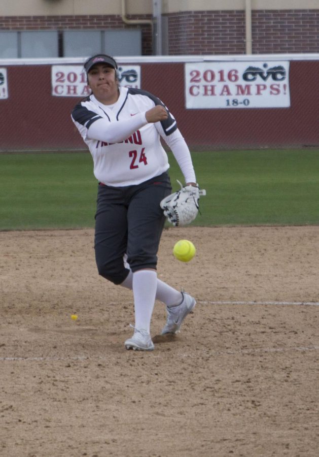 Freshman pitcher Emily Puente pitches in the Rams game against San Joaquin Delta College on Saturday, Feb. 9, 2019. Photo by Ben Hensley