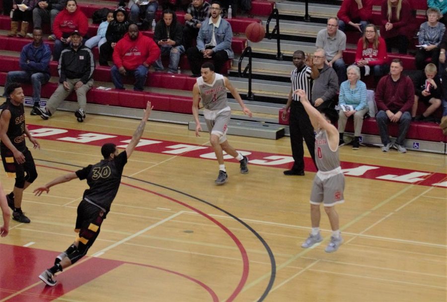 Rams' Freshman guard Eljay Gallegos puts up a three in the second round of the playoffs against Sacramento City College on March 2, 2019.