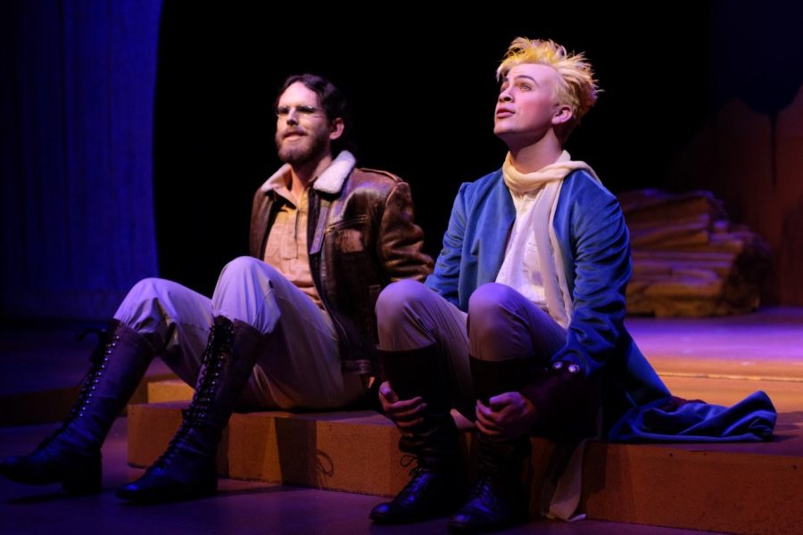 Sean Stoll as The Aviator, left, and Anthony TeNyenhuis as the Little Prince, right, discuss their experiences as they’re stranded in the desert. Photo courtesy of James Knudsen