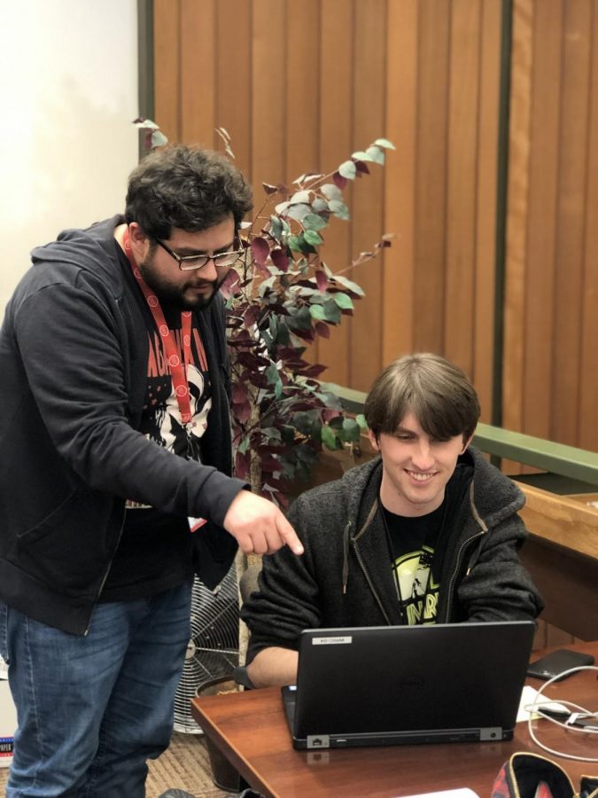 Cody Hoover, left, adjunct instructor from the English department and tutor at the reading and writing center. Jonah Schneider, right, four year student and third year tutor at the reading and writing center, Tuesday, March 12.