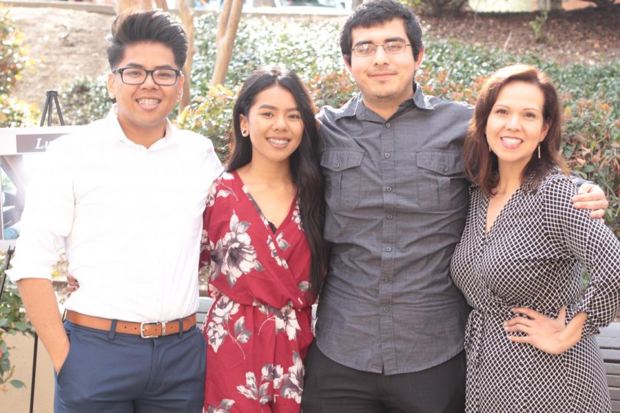 Former foster youth Smoky Rith, Soukii Rith, and Paul Areyen with their NextUp coordinator Veronica Salmeron-Sosa at the debut of “NextUp Photo Voice Project: Through Our Eyes,” an EOPS project geared at highlighting their student perspective through photography, Thursday, March 21, 2019 in ST 103.