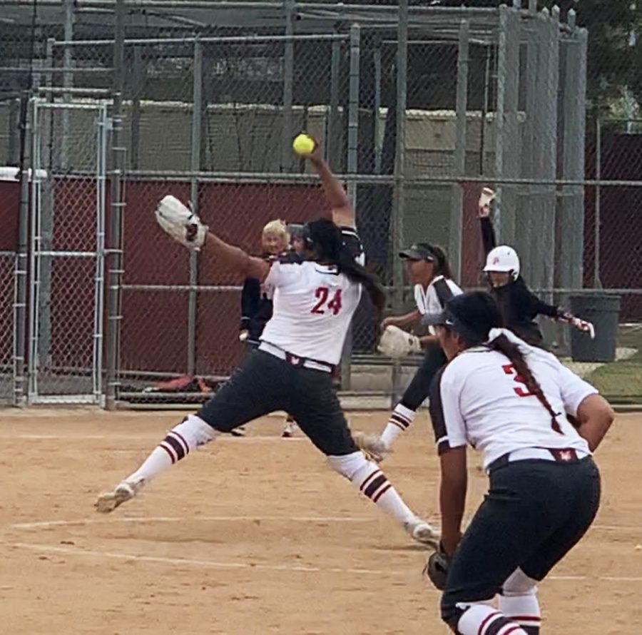 Freshman+pitcher+Emily+Puente+throws+a+pitch+in+the+eighth+inning+against+Porterville+College+on+April+7+at+FCC+Softball+Diamond.+Puente+would+throw+4+%E2%85%93+innings+of+relief+giving+up+three+hits+and+two+unearned+runs+while+striking+out+four.