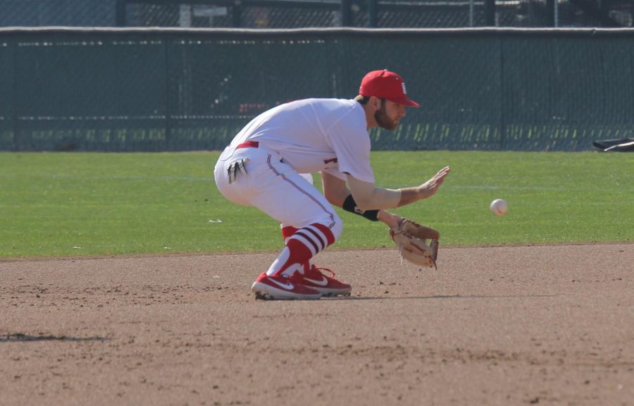 Ian Ross cleanly fields a ground ball during the Rams game against Feather River College on Jan. 27, 2019.