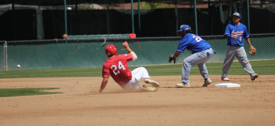 Chet Allison slides in safely at second following a stolen base against West Hills Coaling on April 2, 2019.