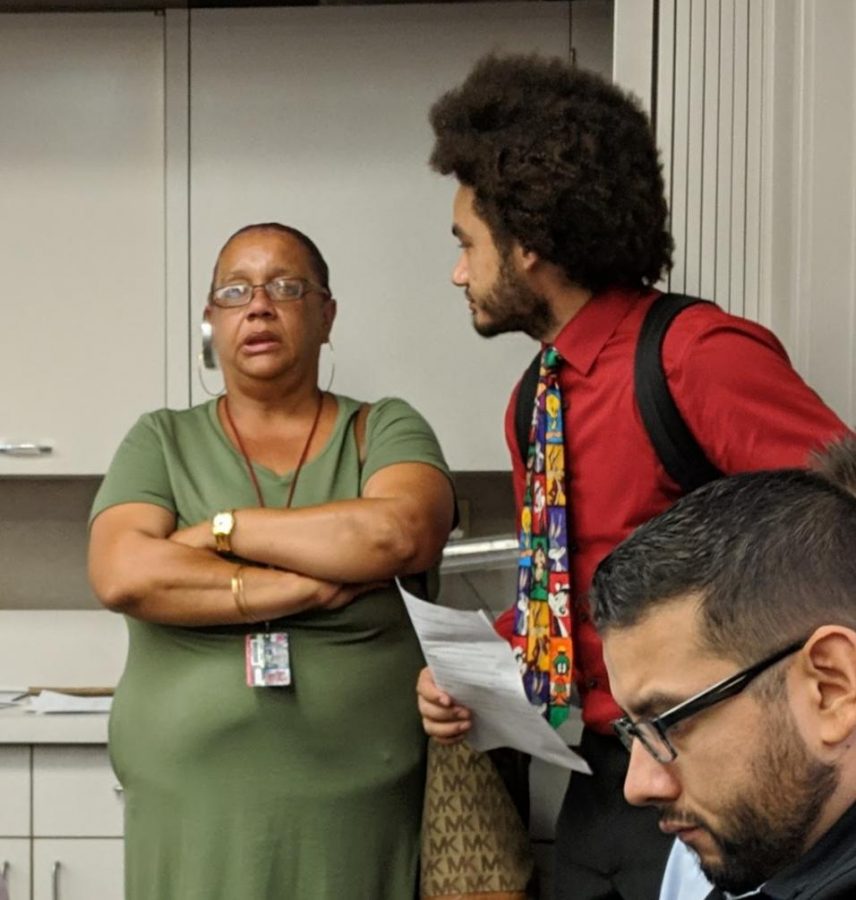 ASG president DeRon Walker, right, listens to FCC student Lola Gayles’ frustrations with the lack of supplies at the FCC bookstore during the SCCCD school board meeting on Sep. 3, 2019 on FCC campus. 