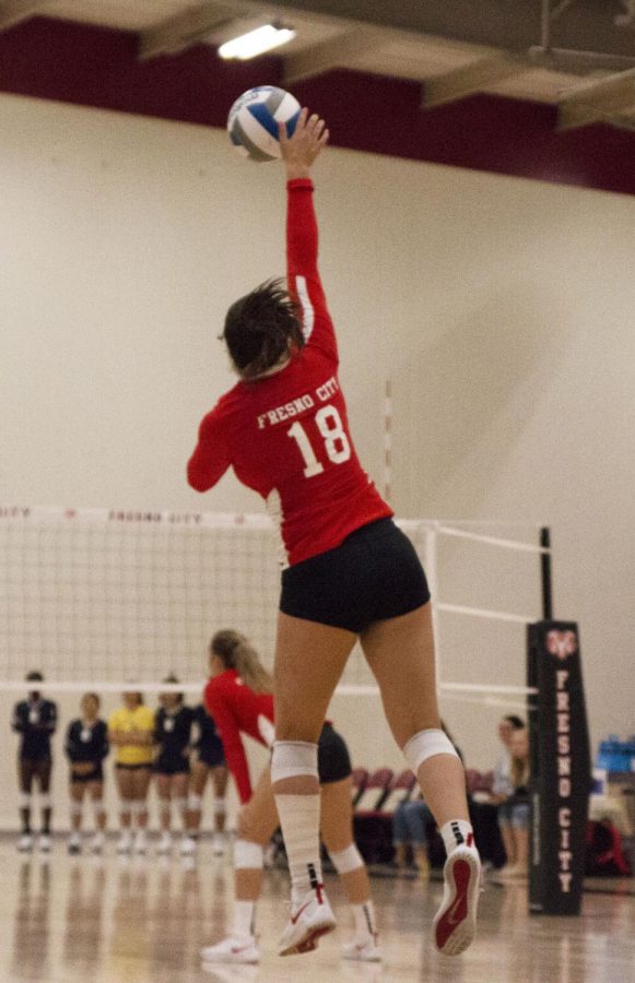 Rams freshman pin setter Taylor Dilley serves during the Rams 3-0 set shutout against the Merced College Blue Devils on Sept. 20, 2019.
