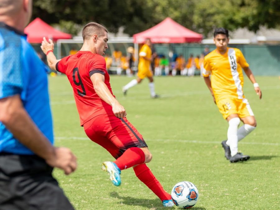 Rams sophomore forward Mason Gonzalez drives the ball up the field during the Rams 2-0 win over Rio Honda on Sept. 7, 2019.