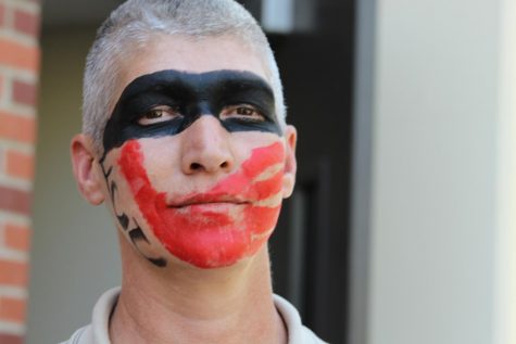 FCC student Robert Davis of the Cherokee tribe shows his support with face paint at the Indigenous Peoples Day rally on Oct. 14, 2019 symbolizing the awareness of missing and murdered indigenous women.