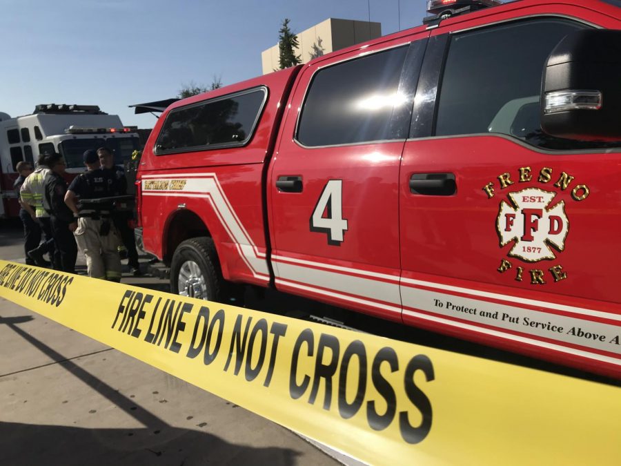 Police and Fresno Fire Department keep the area clear as students are treated and the FCC Math and Science Building is evacuated at 10 a.m. on Thursday, Oct. 10, 2019, following a chemical spill.