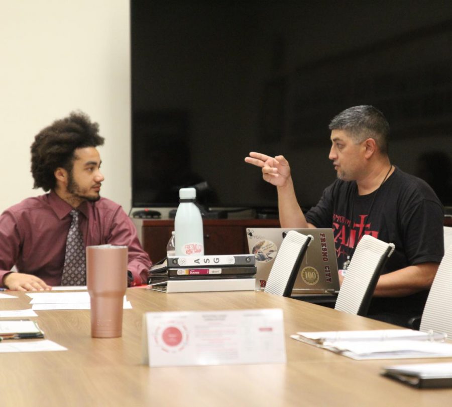 ASG Vice President Armando Garcia, Right, points to clarify to President DeRon Walker, left, at their weekly meeting on Tuesday, Oct. 22, 2019 in the FCC Senate Chambers.