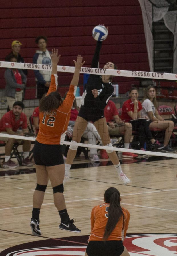 Sophomore pin hitter Julie Castleman goes up for the kill during the Rams dominant 3-0 set victory over the Reedley Tigers on Oct. 2, 2019. The Rams have now won 117 consecutive conference matches, and will go for their 118th on Wednesday when they take on the Porterville Pirates at 6 p.m. at the FCC gymnasium.