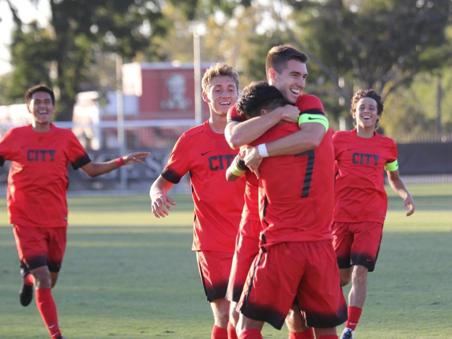 Fresno City College sophomore forwards Mason Gonzalez and Eduardo Segura celebrate after Segura’s first goal in their match against Folsom Lake College on Friday, Oct. 25.