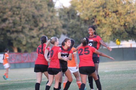 The Rams celebrate a goal during their 4-2 win over conference rival Reedley College during their match on Tuesday, Nov. 5, 2019