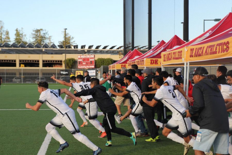 The Rams mens soccer team storms the field to celebrate as champions as the clock expires on their  match against the Mt. San Antonio College Mounties on Dec 8, 2019.