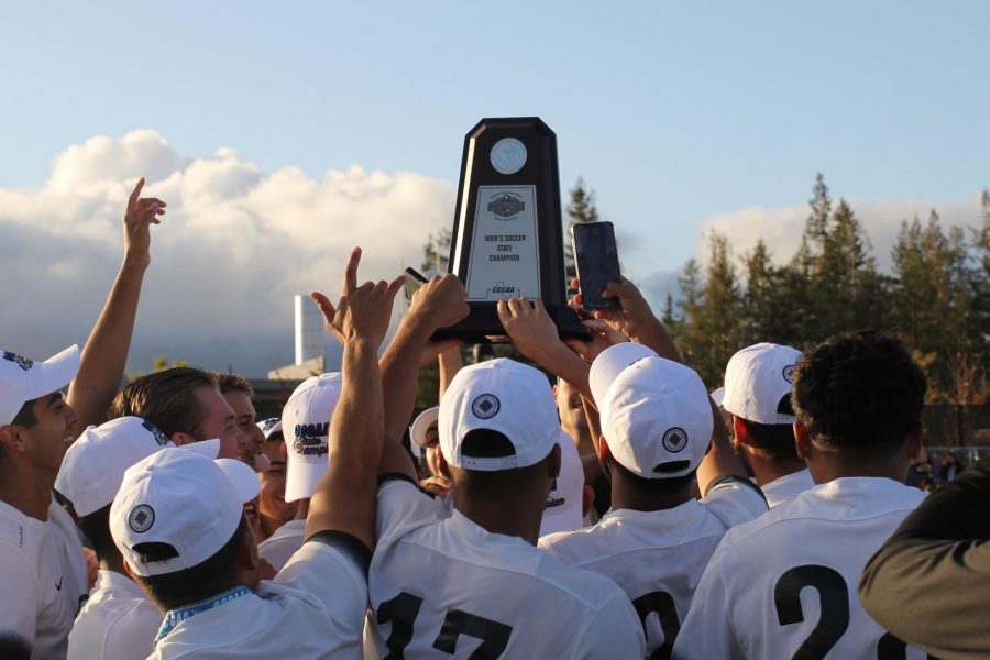 The FCC men's soccer team hoists the CCCAA Men's Soccer State Championship trophy following their 2-0 win in the finals over the Mt. San Antonio College Mounties on Sunday, Dec. 8, 2019.