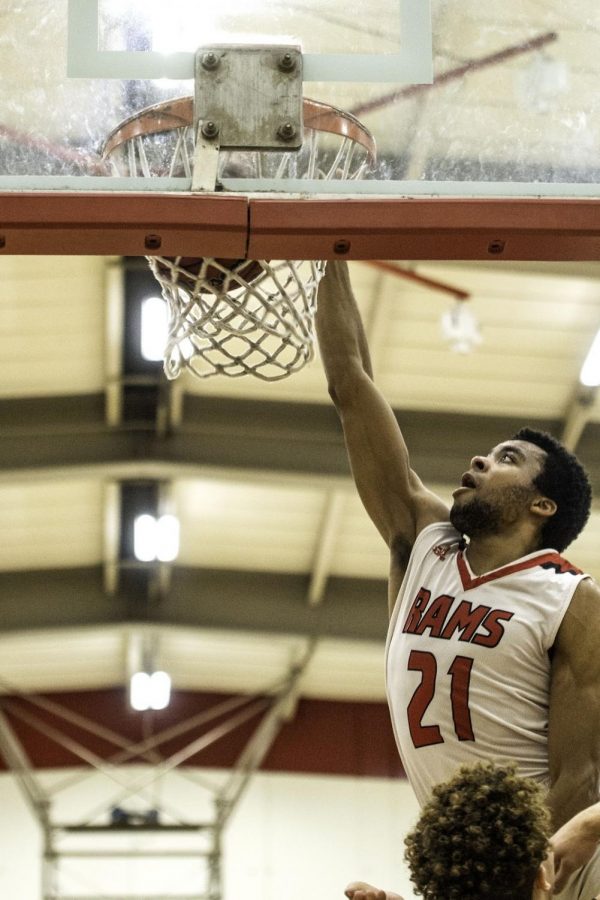 Rams sophomore guard Keshawn Bruner hits a picturesque dunk during the final seconds of regulation against Porterville College on Jan. 18, 2020.