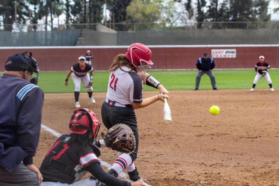 Freshman third baseman Mary Mets during an at-bat in the first game of a doubleheader against Porterville College on Tuesday, March 10. Nets has been an influential player at the top if the Rams lineup.