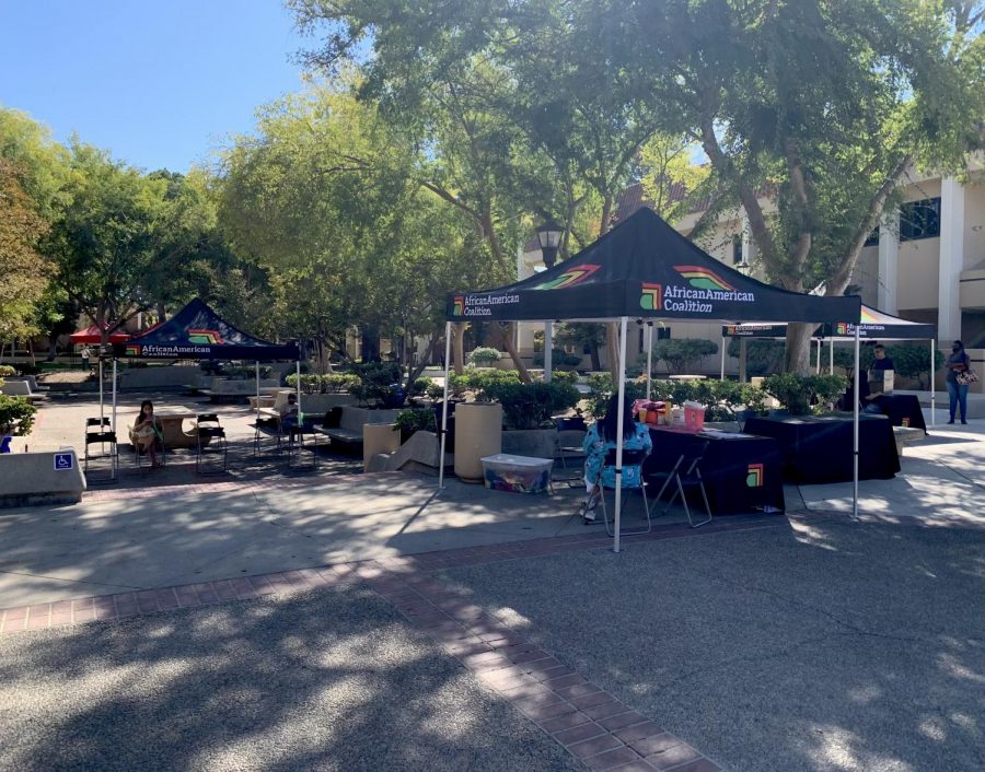 The Black Wellness and Prosperity Center’s African American Coalition administering vaccines on Monday Sept. 13 near the main fountain at Fresno City College. 
