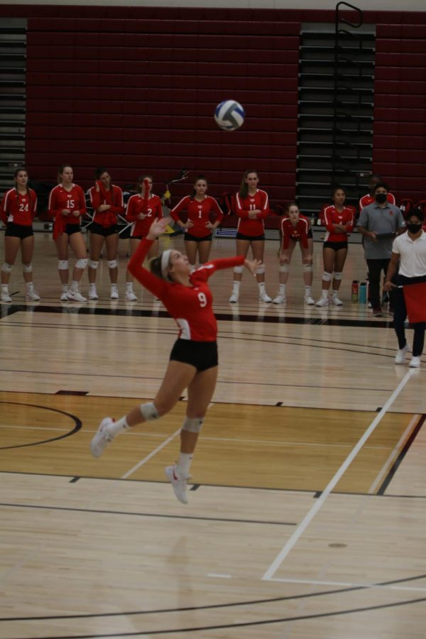 Lexi Pagani serving the ball at the FCC vs. Reedley game on Sept. 22