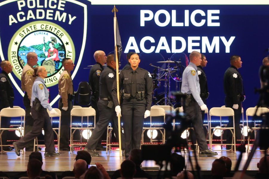 Fresno City College police academy cadets march on stage to kick off their graduation ceremony on Nov. 19. 