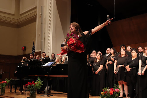 Fresno City College Choral Director Julie Dana, performing the "SING" concert with her students in the Old Administration Building Auditorium.