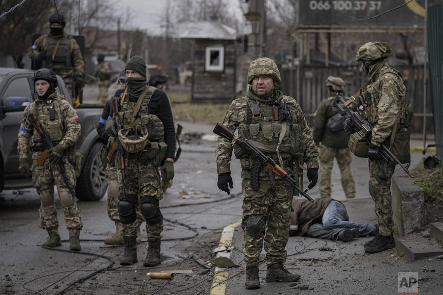 Ukraine soldiers retreat combat zone. April 2, 2022 (AP Photo/Vadim Ghirda)