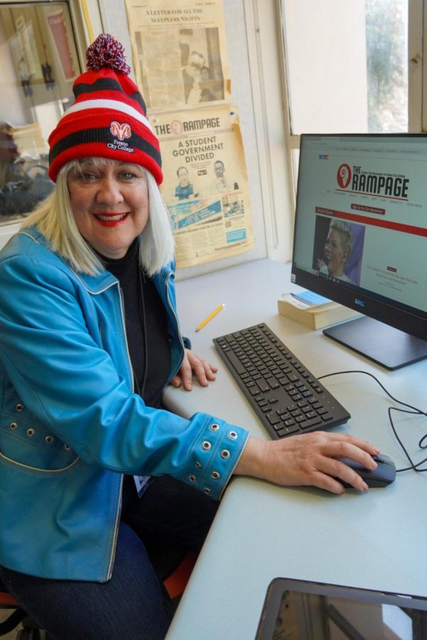 Teresa Randolph, journalism major at Fresno City College, reading articles in the newsroom on March 14, 2023.