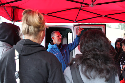KSEE 24 Chief Photographer Kevin Mahan talking with students about how live broadcasts are done during challenging weather conditions. Photo taken on Feb. 24