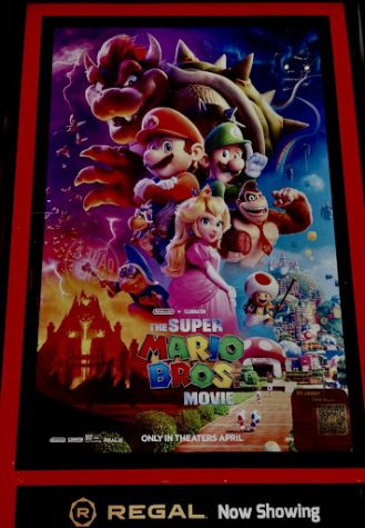 A photo of the Super Mario Bros. Poster taken at Regal River Park on April 17
