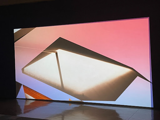 A photo of the exhibit screen used for display at the art gallery. 
